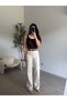 Beige coffee leather belted straight jeans