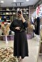 طقم تنورة مزينة بكشكشة على الكتف