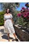 White Dress with Black Daisy Pattern and Belted Gipeli Detail