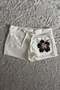 Black Floral Hibiscus Flower White Lace-Up Short Shorts