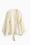 Frayed kaftan jacket