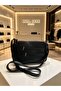 women hand and shoulder bag