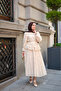 Women's Skirt with Ruffles and Stone Button Detail Set in Cream - 5