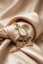 Women's Gold Yellow Oval Case Chain Watch with Zircon Stone and Bee Figured Charm Bracelet Watch