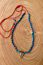 Adjustable Necklace with Red String, Blue Beads and Triangular Object