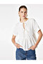 Tie-Back Bow Detail Short Sleeve Textured Peplum Blouse