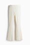 Flared rib-knit trousers - 6