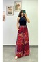 Wide-Leg Pants with Slits on Both Sides, Elastic Waistband and Pocket Details.