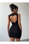 Women's mini dress with heart detail on the back, made from flexible lycra fabric. - 3