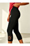 Black Capri Leggings With Laser-Cut Detail - 2