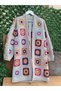 Cardigan with Colorful Motifs on an Ecru Background