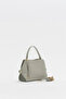 Green charm accessory bag with buckle detail on the sides