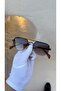 نظارات شمسية بني اللون من تودي