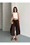 Layered Look Wide-Legged Trousers with Tie-Up Detail - 5