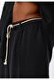 Baggy lyocell pants with belt detail - 6
