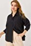 Women's black off-the-shoulder oversized shirt