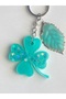 Four-Leaf Clover Keychain with Turquoise Green and Silvery Reflections on It, with Leaf Details