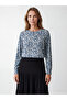 Nevavm Oval Collar Patterned Blouse with a Difference