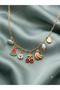 Dolce Vita: Gold Color Pearl and Fruit Figured Necklace