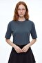 Natural viscose blouse with wide sleeves sitting on the waist