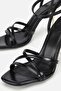 Woman's black cross-strapped gold heeled high Sandals - 4