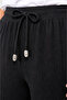 Oversized, loose-fit palazzo pants with elastic waist, drawstring, and wide legs - black - 2