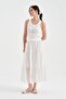 Women's buckle detailed lined belt elastic design long skirt