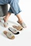 Lumiry Gold Women's Stone-Knotted Strap Flat Shiny Slippers - 5