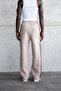 بنطلون رياضي فضفاض للرجال مصنوع يدويًا بتأثير رذاذ باللون الرمادي الفاتح - 3