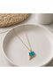 Kly-1052 |   Turquoise Cat Figured Fish Charm Necklace |   Eos Collective