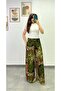 Wide-Leg Pants with Slits on Both Sides, Elastic Waistband and Pocket Details.