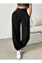 Women's high-waisted, wide-leg viscose pants with drawstring waist and pockets. - 3