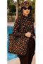 The woman wears a hijab swimsuit. - 4