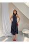 Premium polka dot halter neck midi dress - elegant and functional design