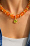 Orange Natural Stone Look Vip Necklace with Sun Figure