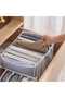 A four-piece denim storage box set, including wardrobe organizers, denim storage boxes, and mesh drawer dividers, suitable for clothing and trousers. - 2