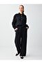 Black Relaxed Fit Wide-Leg Metal Button Woven Trousers - 2