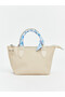 Girl's shoulder bag with scarf accessory