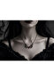 Gothic Necklace with Red Heart Detail and Skeleton Hand Figure – Double Hand Design