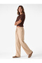 High-Waisted Carrot-Cut Pants with Pockets, Elastic Waistband, and Decorative Laces. - 2