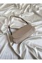 Thai Model Hand and Women's Shoulder Bag Mink