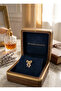 Rice gold color zircon stone bow model earrings. - 4