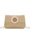 Women's straw clutch - a summer beach bag with rattan details.