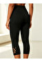 Black Capri Leggings With Laser-Cut Detail - 3