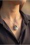 Steel Necklace with Eagle Claw Figure and Natural Stone Tip - 4