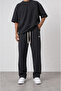 Men's R Embroidered Muslin Baggy Trousers Black