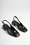 Women's Black 4 cm Thick Short Heeled Open-Back Shoes with Gold Detail