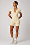 Lumi Zip Sculpt Romper – Butter Cream