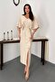 Beige dress with pearl cape