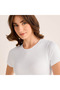 SEAMFREE RIBBED HIGH NECK SHORT SLEEVED TOP - 5